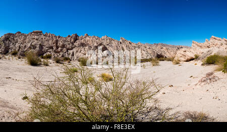 Abstract rock formations with blue sky along the famous Ruta 40 (Route 40) within Calchaqui Valleys in Salta Province. Argentina Stock Photo