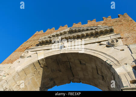 Ancient arch of Augustus (Arco di Augusto) in Rimini, Italy Stock Photo