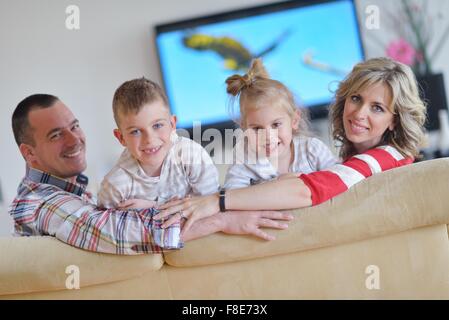 hapy young family have fun  with their children at modern living room home indoors Stock Photo