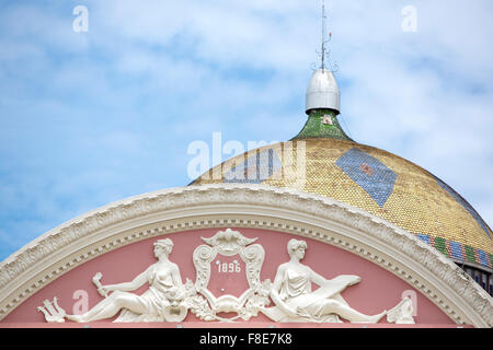 Roof Details from the Amazon Theatre (Portuguese: Teatro Amazonas) with blue cloudy sky, opera house located in Manaus, Brazil Stock Photo