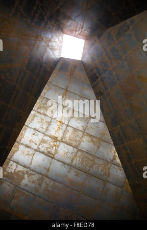 detail of hollow pyramid rusty metal light Stock Photo