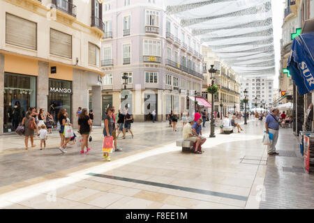 Malaga, Spain-August 31st 2015: People shopping on Marques de Larios. This is the main shopping street in Malaga. Stock Photo