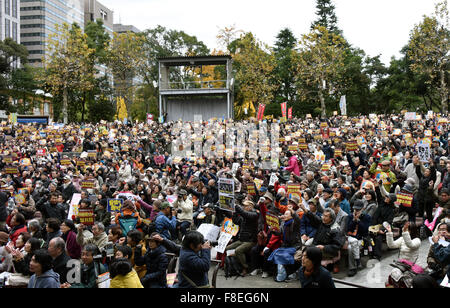 December 6, 2015, Tokyo, Japan - Some 4,500 protesters, including scholars, students and concerned citizens, listen to guest speakers during a protest rally against the national security bill at Tokyo's Hibiya Park on Sunday, December 6, 2015. They voiced their opposition to the controversial law that allows Japanese armed forces to use military action in foreign conflicts for the first time since World War II. (Photo by Natsuki Sakai/AFLO) AYF -mis- Stock Photo