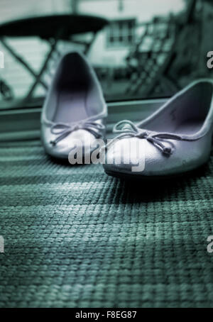 disgarded womens shoes Stock Photo