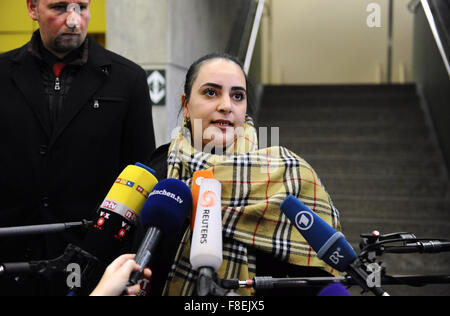 Munich, Germany. 09th Dec, 2015. Joint plaintiff Gamze Kubasik, accompanied by her lawyer Sebastian Scharmer, answers questions from journalists during a break in the NSU trial in the criminal justice center in Munich, Germany, 09 December 2015. The trial in the murders and terror attacks committed by the National Socialist Underground (NSU) continues at the higher regional court. A statement from main defendant Zschaepe was read out by her lawyer. Photo: ANDREAS GEBERT/dpa/Alamy Live News Stock Photo