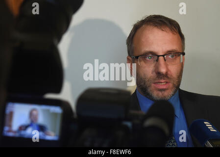 The judge Jaromir Psenica speaks to journalist about the cause of Polish lorry driver at the Regional Court in Novy Jicin, Czech Republic, on Wednesday, December 9, 2015. On July 22, the Polish lorry driver Slawomir Wojciech Sondaj transporting sheet metal entered a level crossing, although the gates were going down and the red light was on. A high-speed Pendolino train, running at 142 km/hour, bumped into the lorry.However, the Polish driver escaped without serious injuries since the train cut off the cab. The rest of the lorry caught fire and the train pushed the burning debris along several Stock Photo