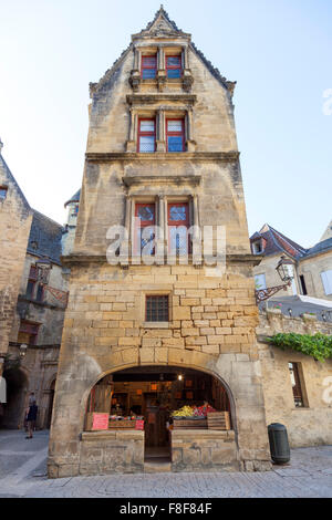 Very similar to the la Boetie's house, the quaint frontage of an old building in the Sarlat la Caneda centre (France). Stock Photo