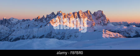 View on the Pale di San Martino mountain group. Alpenglow at sunset. Winter season. The Dolomites. Italian Alps. Europe. Stock Photo