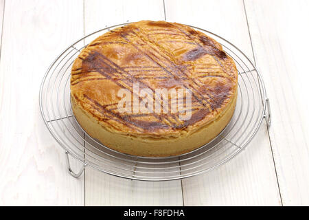 homemade gateau basque on cake cooler, cake making Stock Photo