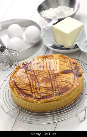 homemade gateau basque on cake cooler, cake making Stock Photo