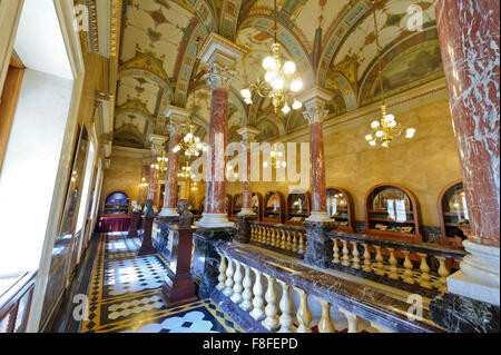 The beautiful interior with marble pillars and decorated ceiling at the Hungarian State Opera House in Budapest, Hungary. Stock Photo