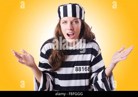 Convict criminal in striped uniform Stock Photo