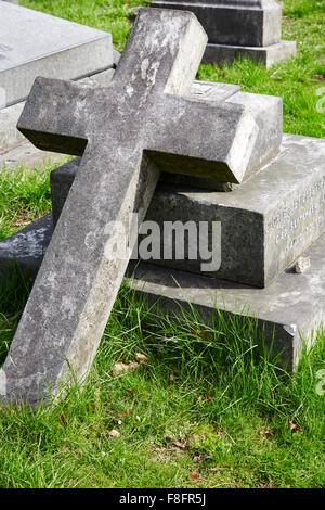 Broken stone cross gravestone in Church Cemetery, Nottingham, England, UK. Stock Photo