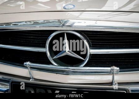 Mercedes-Benz Badge on Front Grille of Car Stock Photo