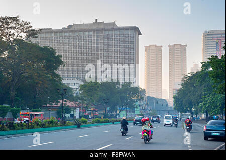 Morning traffic on the street in Manila, Philippines. Stock Photo