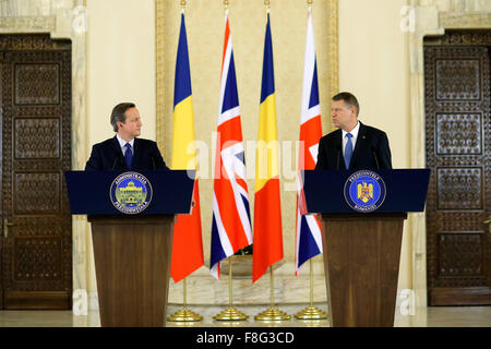Bucharest, Romania. 9th Dec, 2015. British Prime Minister David Cameron (L) and Romanian President Klaus Iohannis attend a press conference after their bilateral meeting at Cotroceni presidential Palace, Bucharest, capital of Romania, Dec. 9, 2015. The European Union (EU) is stronger with Britain inside it and Britain is stronger inside the EU, Romanian President Klaus Iohannis said Wednesday after meeting with visiting British Prime Minister David Cameron. Credit:  Cristian Cristel/Xinhua/Alamy Live News Stock Photo