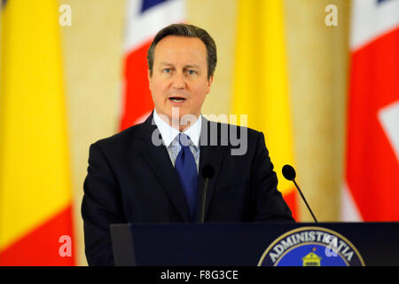 Bucharest, Romania. 9th Dec, 2015. British Prime Minister David Cameron attends a press conference with Romanian President Klaus Iohannis (not in the picture) after their meeting at Cotroceni Presidential Palace, Bucharest, capital of Romania, Dec. 9, 2015. The European Union (EU) is stronger with Britain inside it and Britain is stronger inside the EU, Romanian President Klaus Iohannis said Wednesday after meeting with visiting British Prime Minister David Cameron. Credit:  Cristian Cristel/Xinhua/Alamy Live News Stock Photo