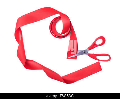 Scissors cuts red ribbon. Stock Photo