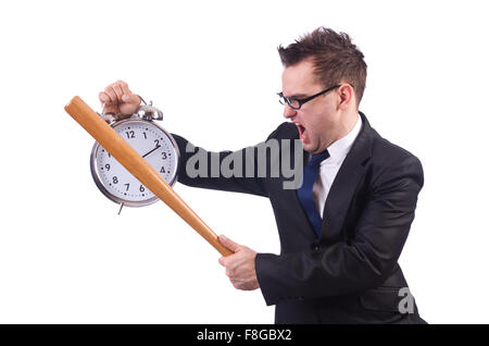 Man hitting the clock with baseball bat isolated on the white Stock Photo