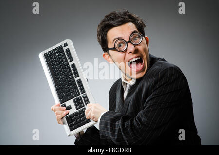 Comouter geek with computer keyboard Stock Photo