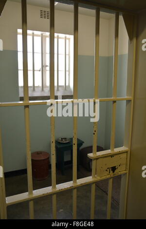 Nelson Mandela's prison cell furnished as when he was incarcerated at the Robben Island prison off of Cape Town South Africa Stock Photo