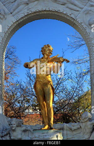 The 'golden' statue of Johann Strauss in Stadtpark  ('city park') Vienna, Austria. Stock Photo