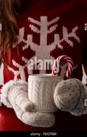 Winter coffee with a candy cane Stock Photo