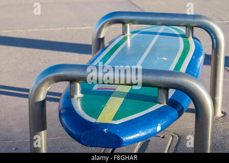 bench, empty bench, surfboard, colorful. Stock Photo