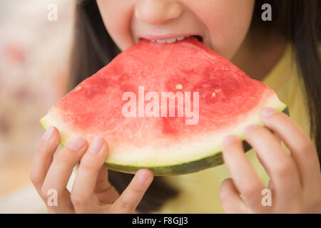 Close up of girl eating watermelon Stock Photo