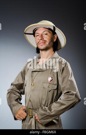 Funny safari hunter against background Stock Photo - Alamy