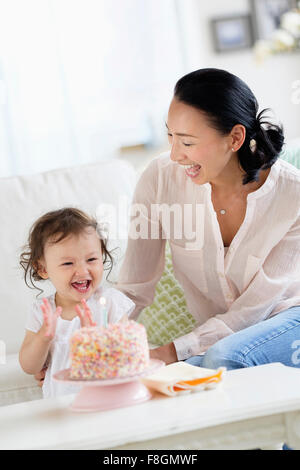 Mother and baby daughter celebrating birthday Stock Photo