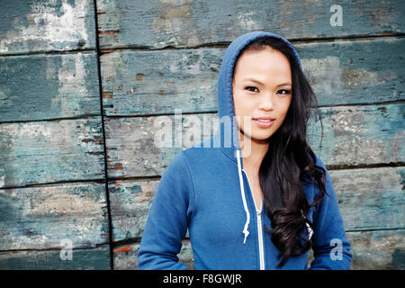 Asian woman wearing hoodie Stock Photo