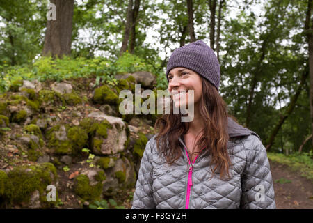 Hispanic woman in forest Stock Photo