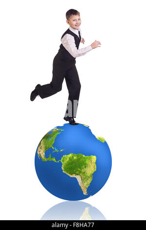 Little boy stands on the big earth. Stock Photo