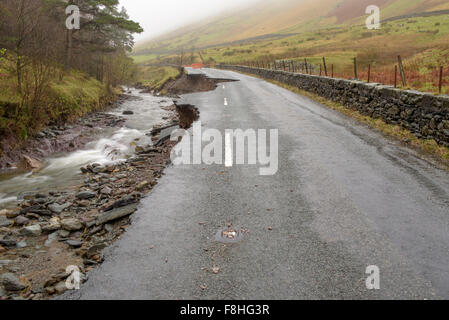Lake District, Cumbria, UK. 09th Dec, 2015. The aftermath of storm Desmond, The A591 main road through the Lake district collapse and is washed away Credit:  Rafael Garea-Balado/Alamy Live News Stock Photo