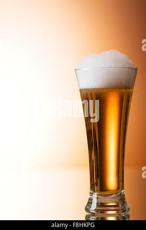 Beer glasses against the colorful gradient background Stock Photo