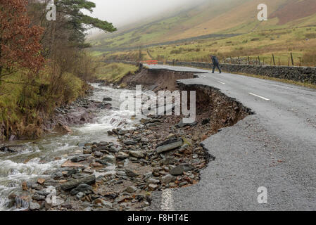 The aftermath of storm Desmond, The A591 main road through the Lake district collapse and is washed away Stock Photo