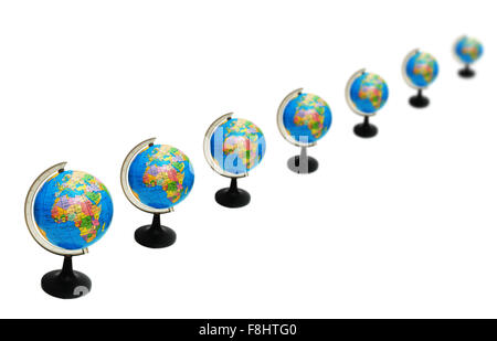 Globes arranged in rows isolated on the white background Stock Photo