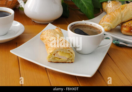 Roll out puff pastry with ham and cheese Stock Photo