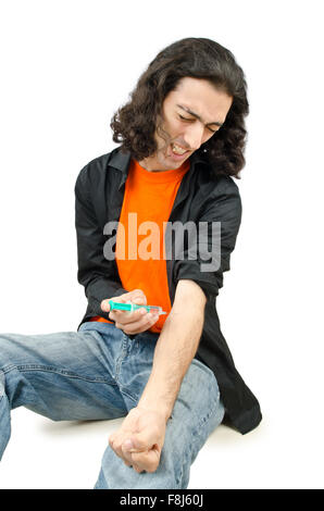 Drug addict during injection Stock Photo