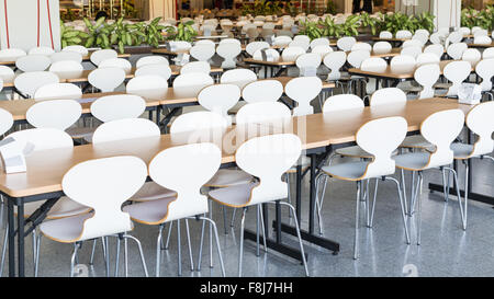 Tables and chairs empty in canteen Stock Photo