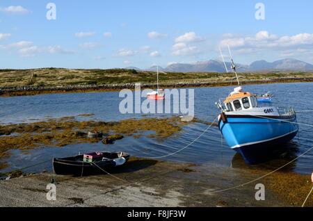 fishing boats in the small Irish harbour of Inishnee island Roundstone Connemara county Galway Ireland Stock Photo