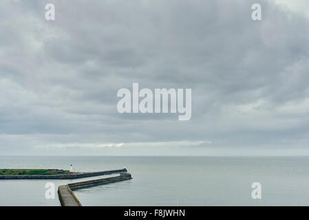 Elevated seascape and harbour walls, Maryport, Cumbria, UK Stock Photo