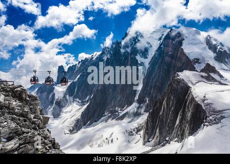 Elevated view of cable cars over snow covered valley at Mont blanc, France Stock Photo