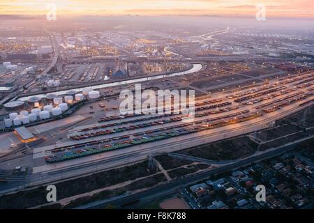 Aerial view of oil refinery and cargo containers, evening, Los Angeles, California, USA Stock Photo