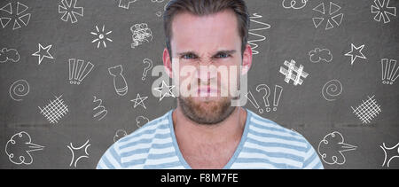 Composite image of angry man over white background Stock Photo