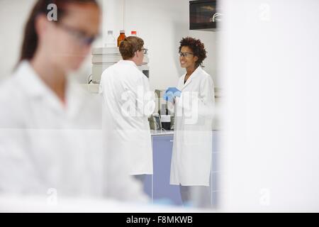 Scientists working in laboratory Stock Photo