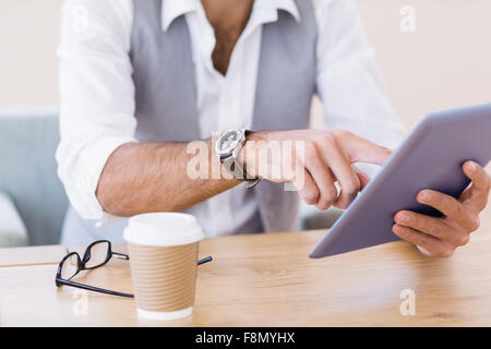 Close up of man using tablet Stock Photo