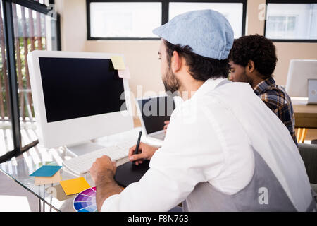 Gay couple working in office Stock Photo