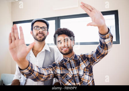 Smiling gay couple talking Stock Photo
